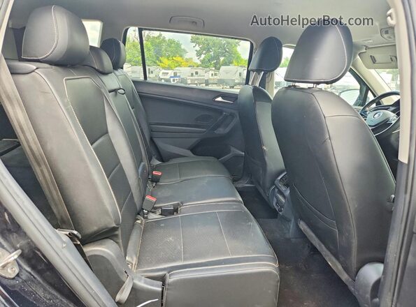 3VV3B7AX5MM004173 2021 VOLKSWAGEN TIGUAN Black Rear interior view