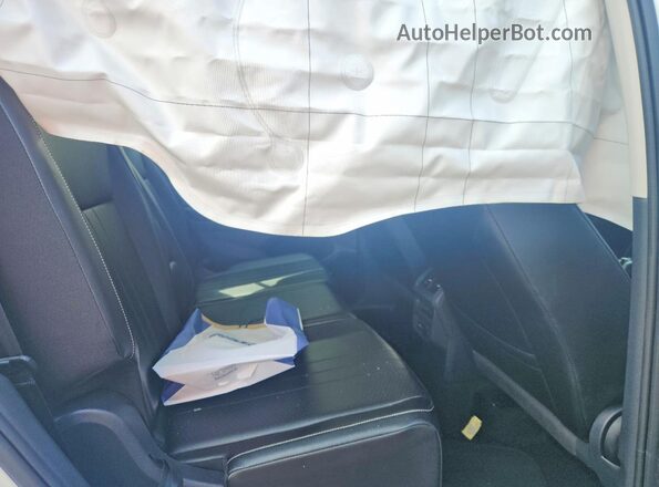 3VV3B7AX8RM133354 2024 VOLKSWAGEN TIGUAN White Rear interior view