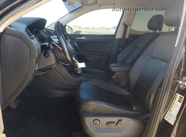 3VV3B7AX9JM023143 2018 VOLKSWAGEN TIGUAN Black წინა სალონის ხედი