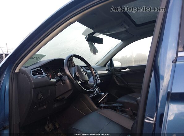 3VV3B7AX9JM166397 2018 VOLKSWAGEN TIGUAN Blue Vista interior delantera