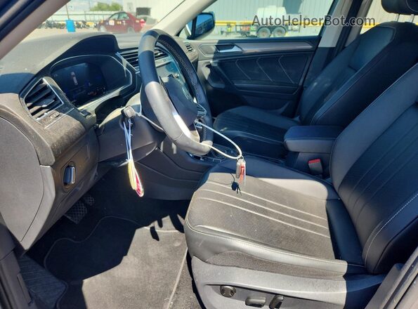 3VV3B7AX9PM110243 2023 VOLKSWAGEN TIGUAN Charcoal Вид салону спереду
