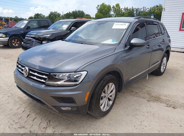3VV3B7AXXJM026875 2018 VOLKSWAGEN TIGUAN Light Blue Առջևի ձախ երեք քառորդ տեսարան