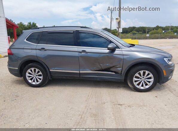 3VV3B7AXXJM026875 2018 VOLKSWAGEN TIGUAN Light Blue Սալոնի հետևի տեսք