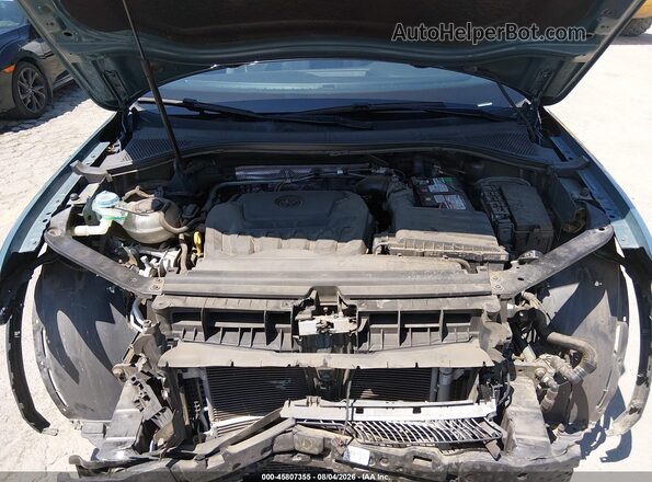 3VV3B7AXXMM050954 2021 VOLKSWAGEN TIGUAN Light Blue Вид сзади