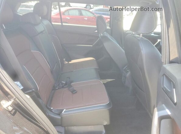 3VV4B7AX0RM063028 2024 VOLKSWAGEN TIGUAN Черный Вид задней части салона