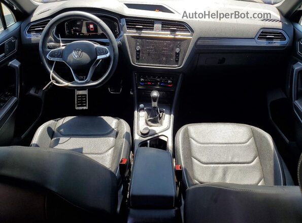 3VV4B7AX1PM039253 2023 VOLKSWAGEN TIGUAN Blue Dashboard view