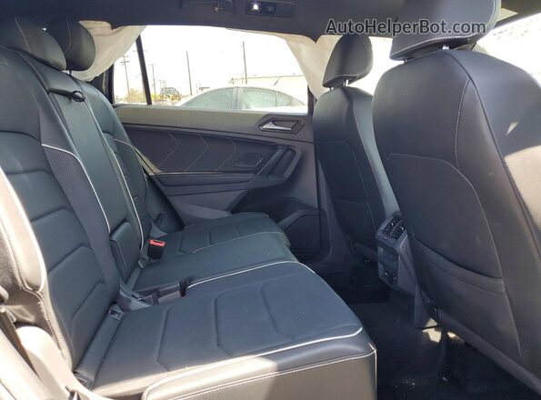 3VV4B7AX1PM039253 2023 VOLKSWAGEN TIGUAN Blue Rear interior view