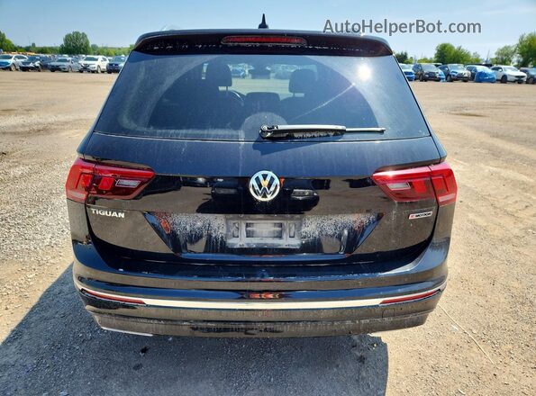 3VV4B7AX7LM022337 2020 VOLKSWAGEN TIGUAN Black Rear view