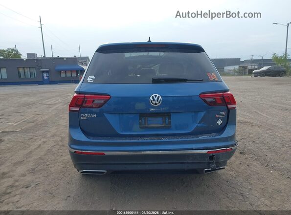 3VV4B7AX8JM196317 2018 VOLKSWAGEN TIGUAN Blue 
