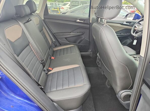 3VV4X7B28RM090885 2024 VOLKSWAGEN TAOS Blue Вид задньої частини салону