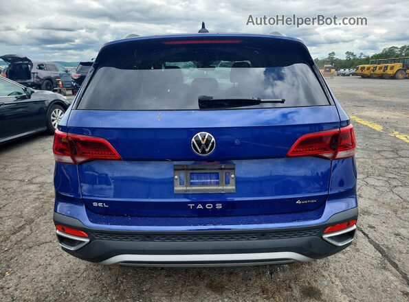 3VV4X7B28RM090885 2024 VOLKSWAGEN TAOS Blue Вид ззаду