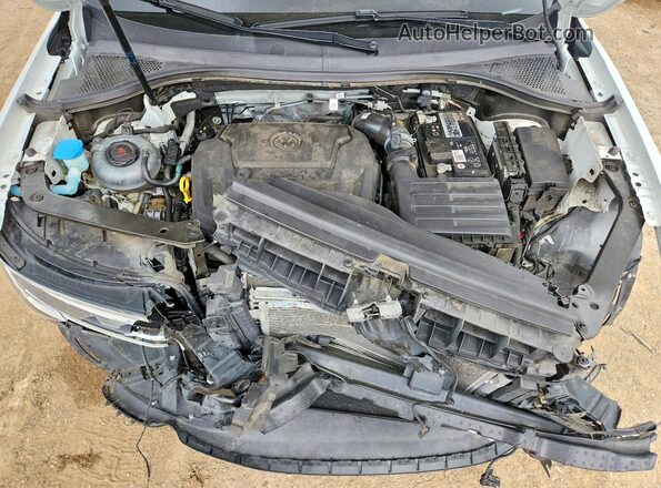 3VV8B7AX4NM067983 2022 VOLKSWAGEN TIGUAN White Vista interior trasera