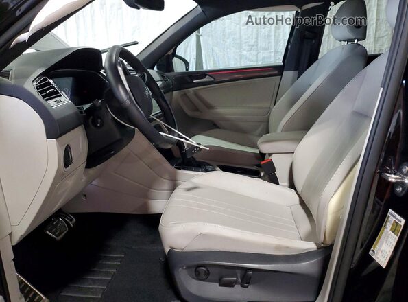 3VV8B7AX5RM180993 2024 VOLKSWAGEN TIGUAN Black Widok wnętrza z przodu