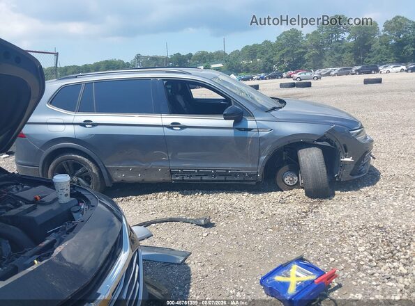 3VV8B7AX6RM031122 2024 VOLKSWAGEN TIGUAN Серый Вид задней части салона
