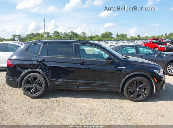 3VV8B7AX8RM004343 2024 VOLKSWAGEN TIGUAN Black Rear interior view