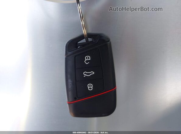 3VV8C7B2XSM059575 2025 VOLKSWAGEN TAOS White Առջևի վահանակի տեսք