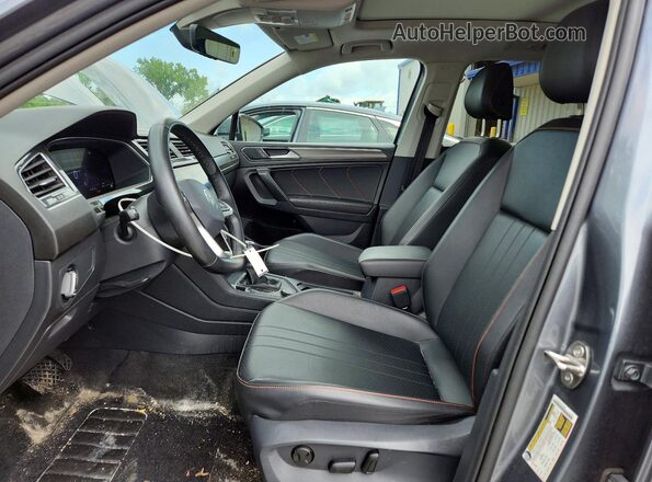 3VVAB7AX6RM218913 2024 VOLKSWAGEN TIGUAN Blue წინა სალონის ხედი