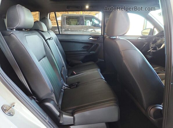 3VVCB7AX1PM011853 2023 VOLKSWAGEN TIGUAN White Vista interior trasera