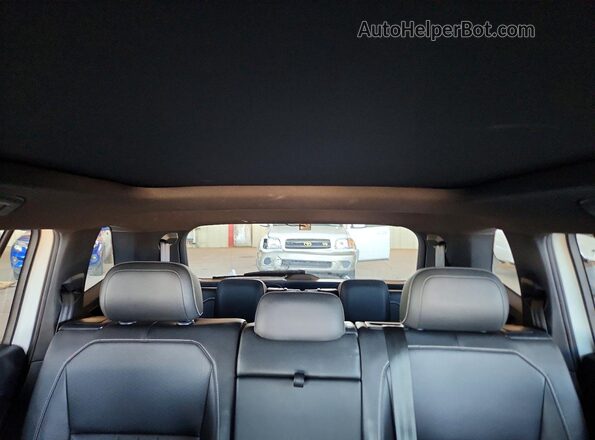3VVCB7AX1PM011853 2023 VOLKSWAGEN TIGUAN White Vista de los asientos traseros