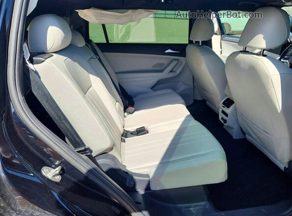 3VVCB7AX2PM075951 2023 VOLKSWAGEN TIGUAN Black Vista interior trasera