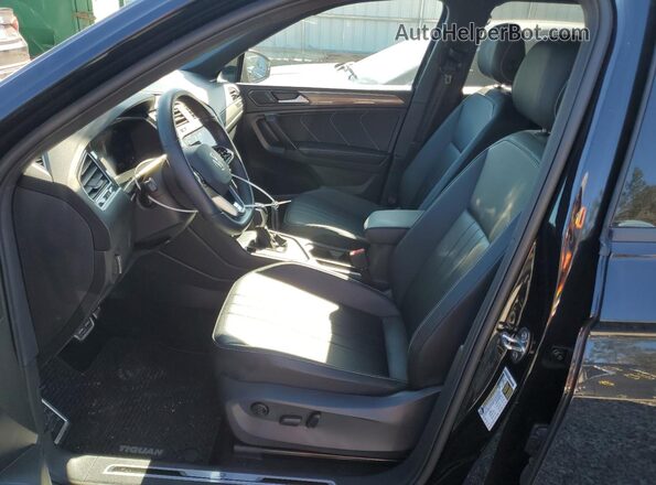 3VVCB7AX3PM113168 2023 VOLKSWAGEN TIGUAN Black Вид салону спереду