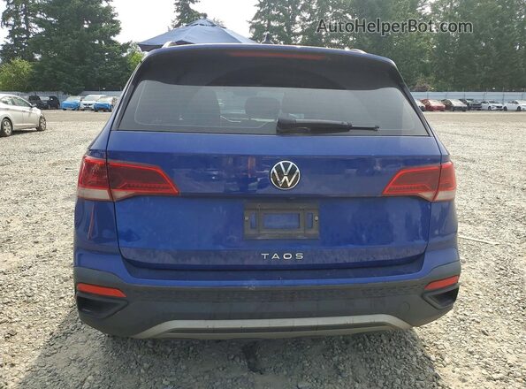 3VVCX7B22PM382704 2023 VOLKSWAGEN TAOS Blue უკანა ხედი