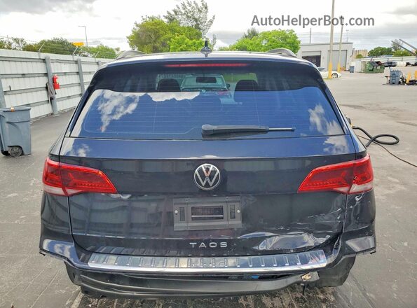 3VVCX7B28NM031342 2022 VOLKSWAGEN TAOS Black Rear view