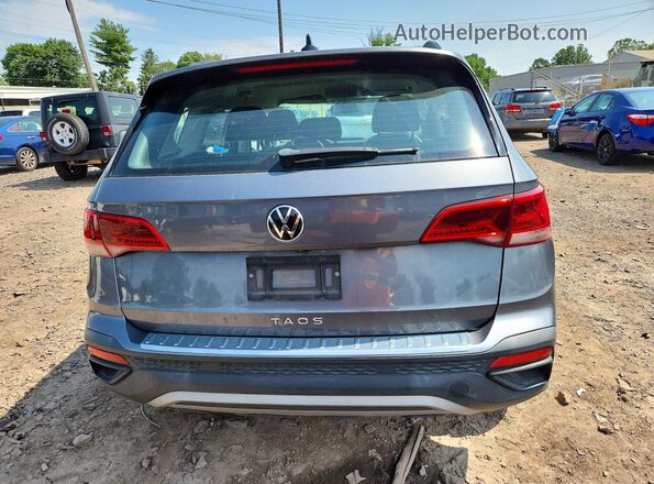 3VVCX7B29NM052006 2022 VOLKSWAGEN TAOS Teal Вид ззаду