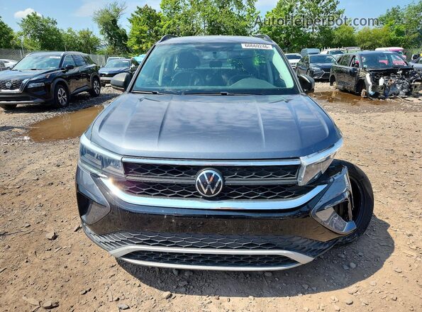 3VVCX7B29NM052006 2022 VOLKSWAGEN TAOS Teal Вид спереду