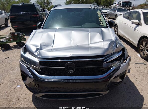 3VVCX7B2XNM017717 2022 VOLKSWAGEN TAOS Серебряный Вид панели приборов