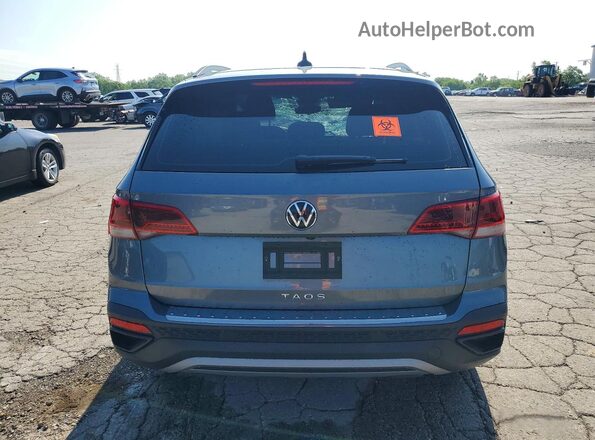 3VVDX7B26PM381639 2023 VOLKSWAGEN TAOS Серый Вид сзади