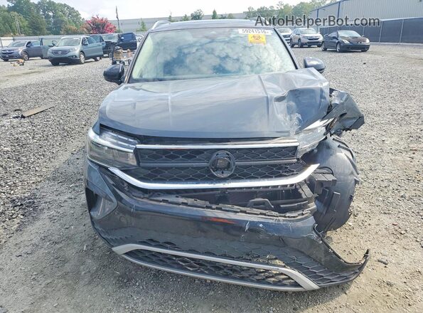 3VVEX7B23RM010882 2024 VOLKSWAGEN TAOS Gray Front view