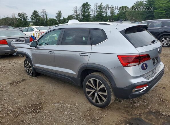 3VVEX7B24PM368103 2023 VOLKSWAGEN TAOS Silver Trasero izquierdo