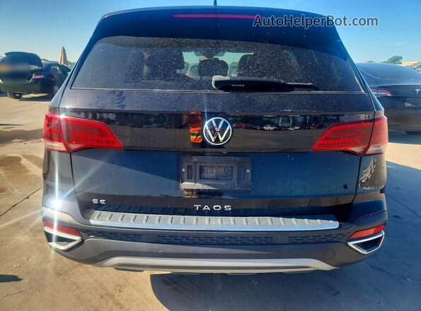 3VVEX7B24PM372183 2023 VOLKSWAGEN TAOS Black Вид ззаду