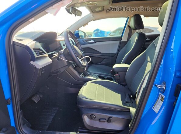 3VVEX7B25PM303017 2023 VOLKSWAGEN TAOS Blue წინა სალონის ხედი