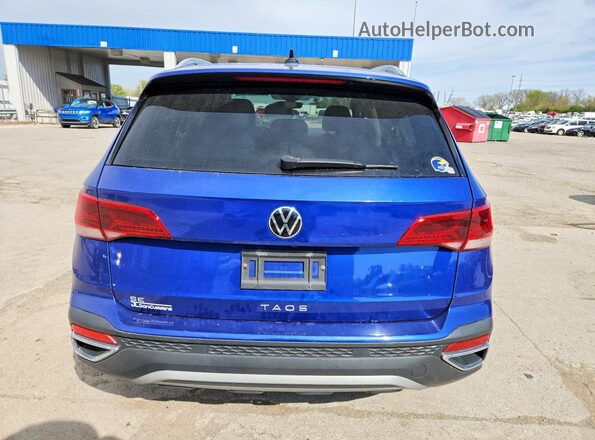 3VVEX7B2XPM306947 2023 VOLKSWAGEN TAOS Blue Vista trasera