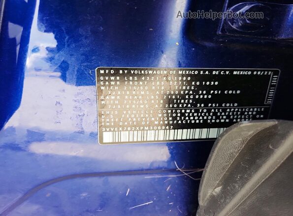 3VVEX7B2XPM306947 2023 VOLKSWAGEN TAOS Blue Vista de la etiqueta del VIN