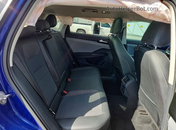 3VVEX7B2XPM306947 2023 VOLKSWAGEN TAOS Blue Vista interior trasera