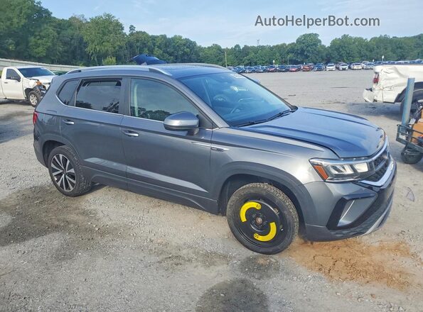 3VVLX7B21NM099000 2022 VOLKSWAGEN TAOS Gray Front right