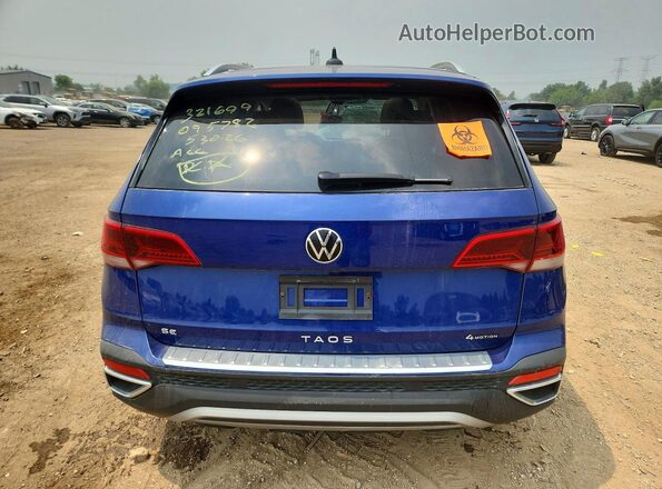 3VVLX7B24NM095782 2022 VOLKSWAGEN TAOS Blue Вид ззаду