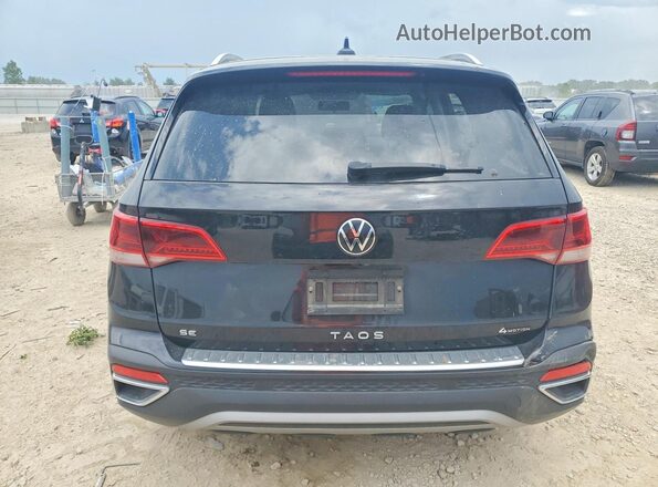 3VVLX7B2XNM068649 2022 VOLKSWAGEN TAOS Black უკანა ხედი