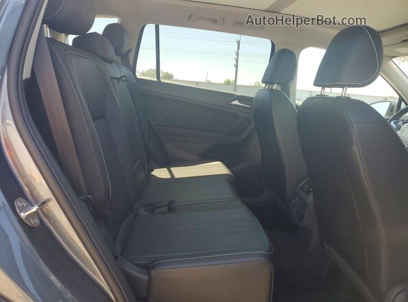 3VVMB7AX6RM015274 2024 VOLKSWAGEN TIGUAN Charcoal Rear interior view