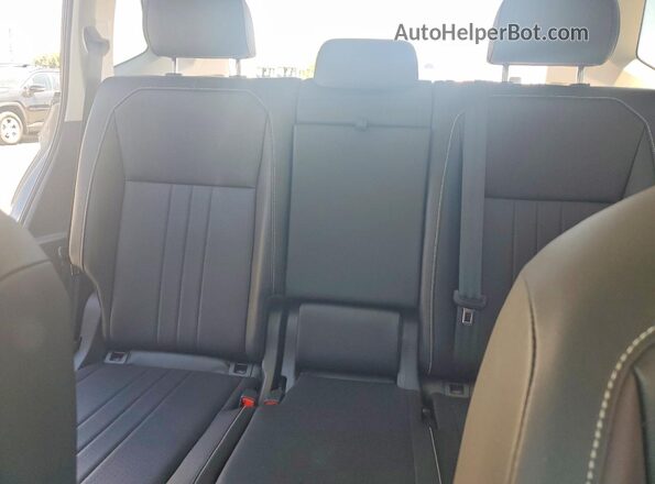 3VVMB7AX6RM015274 2024 VOLKSWAGEN TIGUAN Charcoal Rear seats view