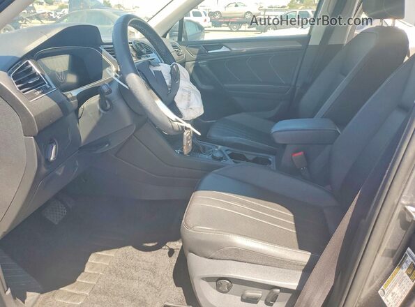 3VVMB7AX6RM015274 2024 VOLKSWAGEN TIGUAN Charcoal Front interior view