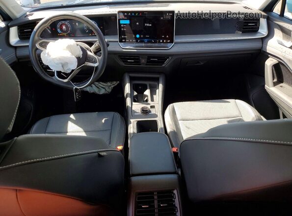 3VVMR7RM0SM052736 2025 VOLKSWAGEN TIGUAN Blue Vista del salpicadero