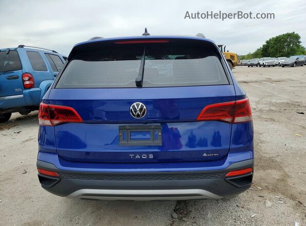 3VVMX7B22NM023046 2022 VOLKSWAGEN TAOS Синий Вид сзади