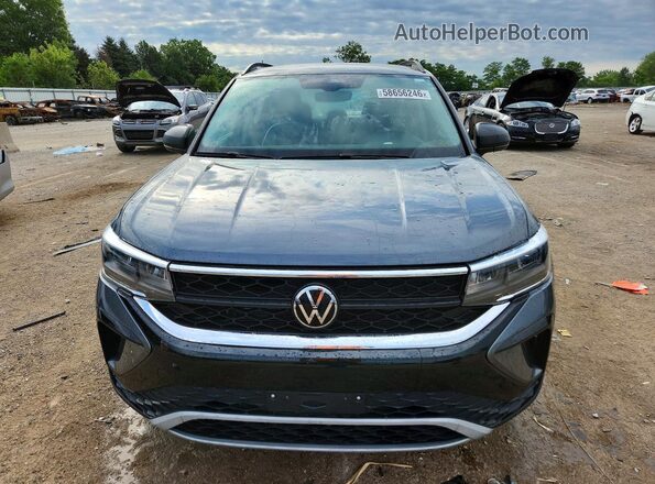 3VVMX7B22PM370301 2023 VOLKSWAGEN TAOS Серый Вид спереди