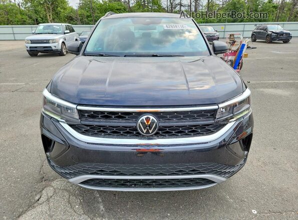 3VVMX7B25PM381888 2023 VOLKSWAGEN TAOS Black Вид спереду