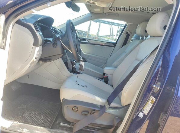 3VVNB7AX3PM087762 2023 VOLKSWAGEN TIGUAN Blue Front interior view