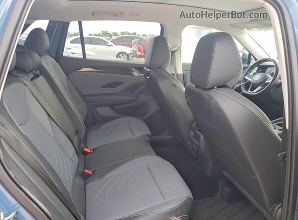 3VVNR7RM4SM073240 2025 VOLKSWAGEN TIGUAN Blue Vista de los asientos traseros